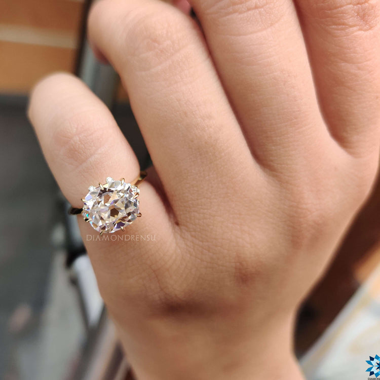 Diamondrensu UK cushion old mine cut moissanite ring.
