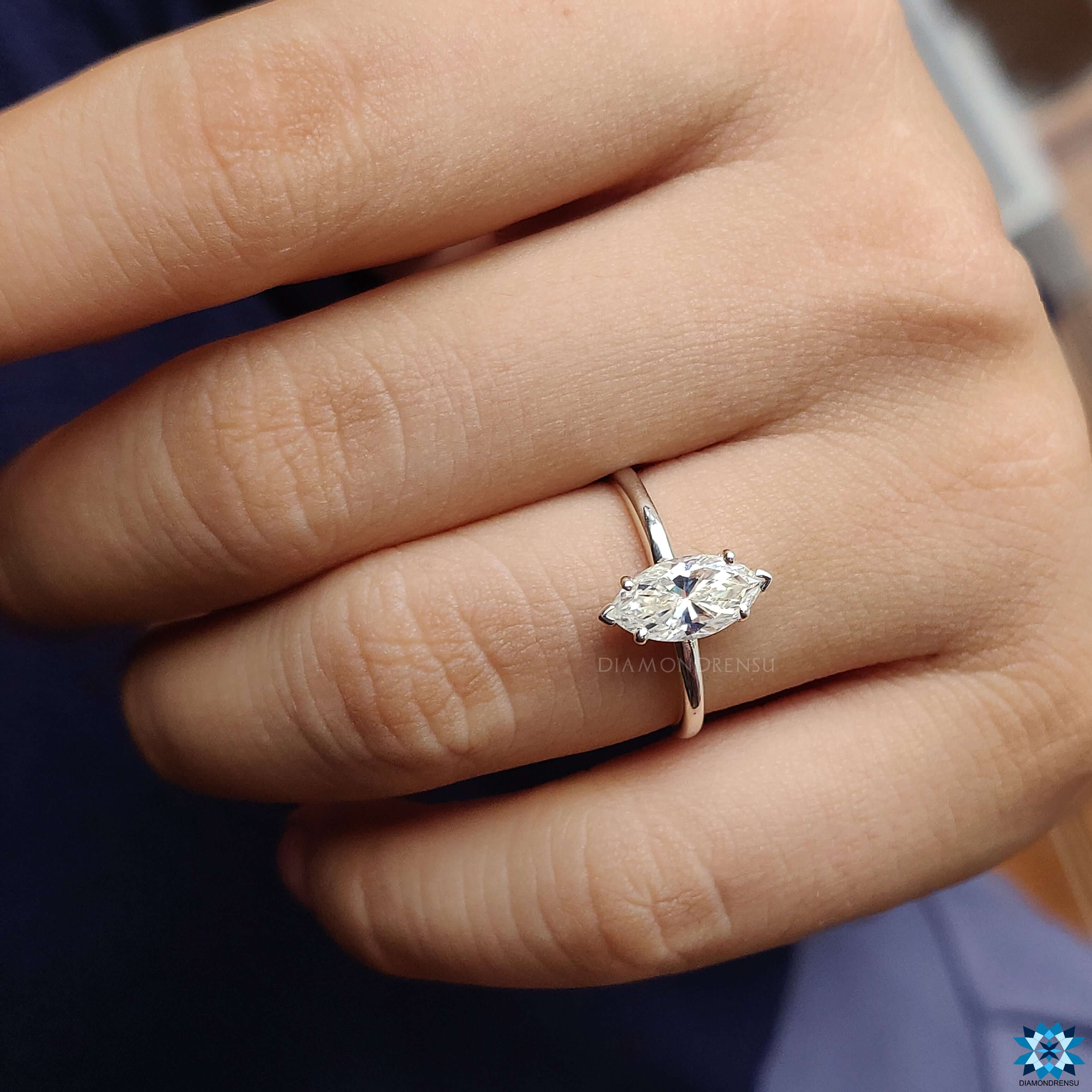 Close-up of a moissanite marquise ring showcasing its elegant shape and IGI certification