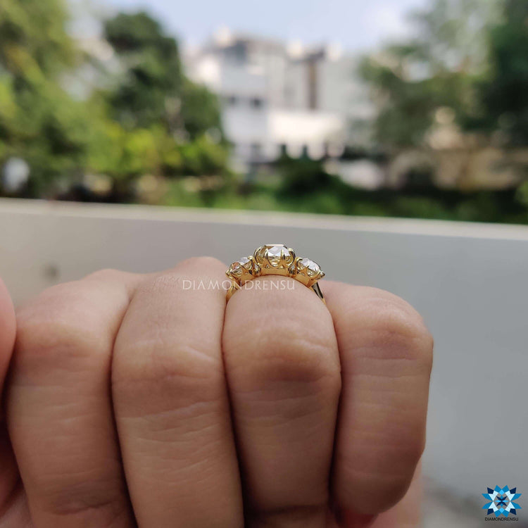 Custom moissanite engagement ring with historic cut stones.

