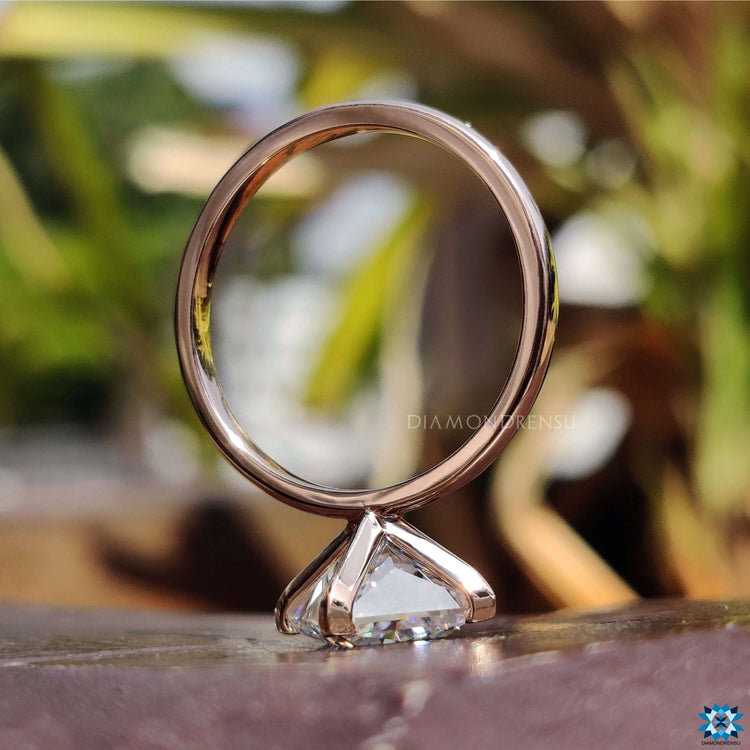 Rose gold princess cut engagement ring.
