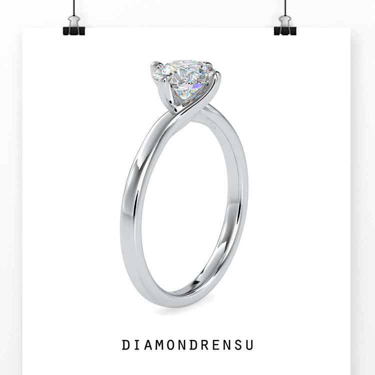 Handmade solitaire ring crafted in rose gold.
