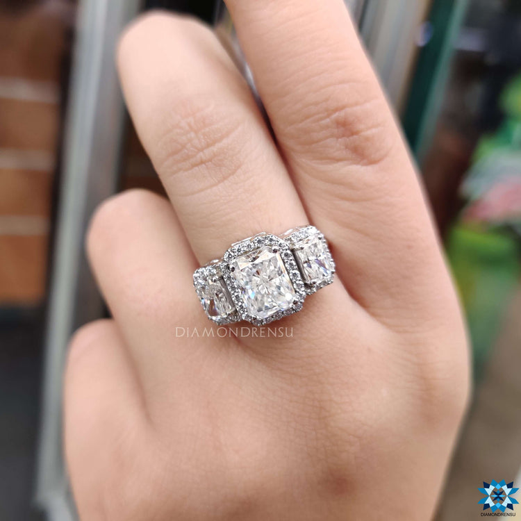 Moissanite engagement ring with art deco inspired halo.
