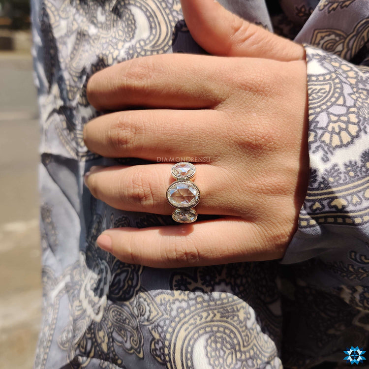 Oval engagement ring with prong setting.
