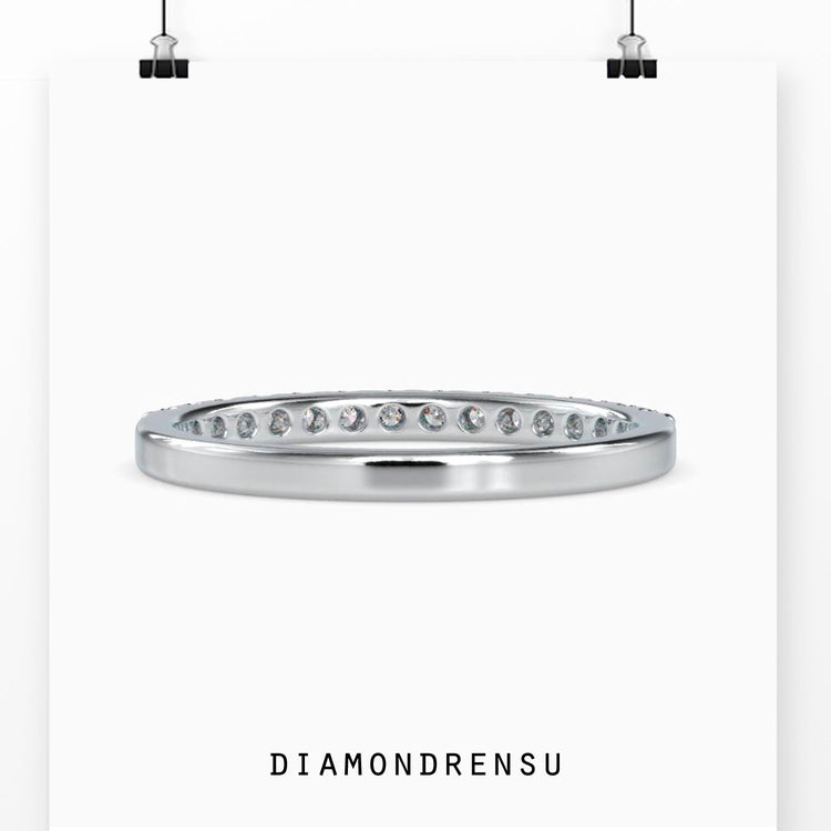 Round diamond half eternity band in UK finish.
