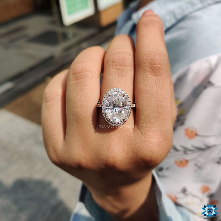 Moissanite halo ring with hidden halo setting.
