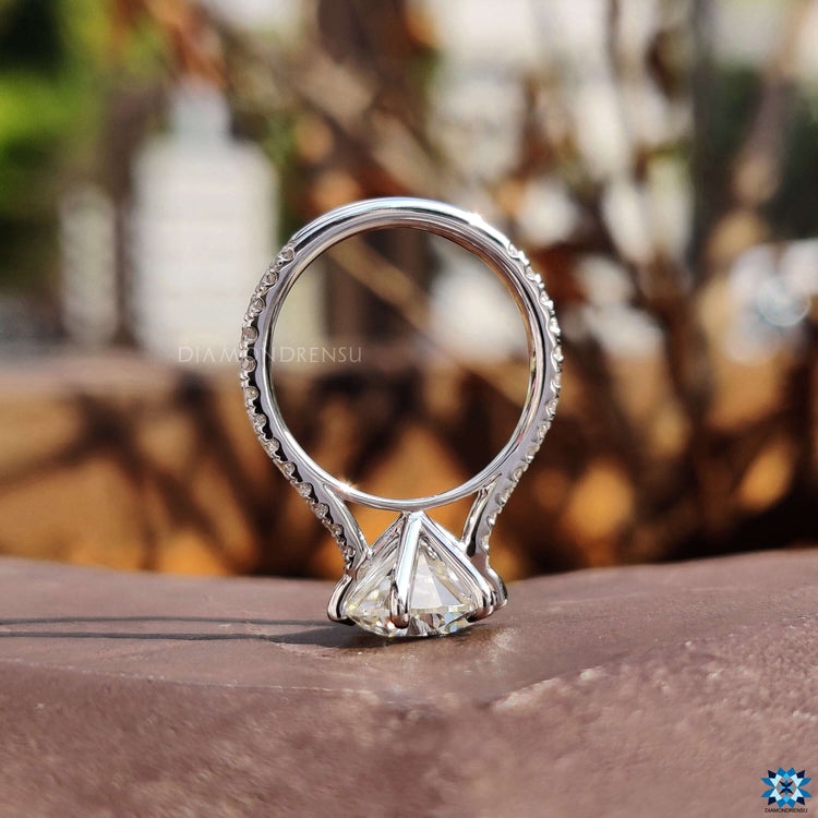 Handmade ring with round pave band.

