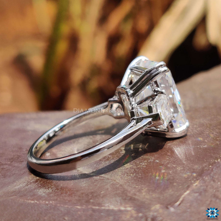 Handmade three stone ring in double claw prong setting.
