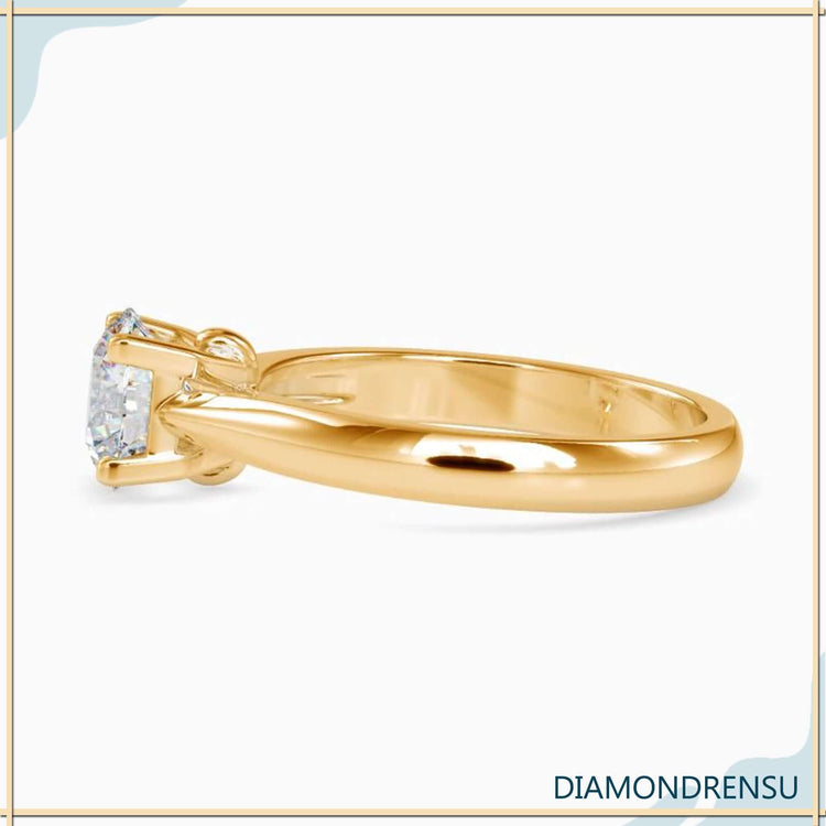 A breathtaking UK engagement ring set with a lab grown diamond and fine metalwork.
